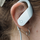 Powerbeats 4 offer a secure fit with an around-the-ear hook and a cord that connects the earbuds.